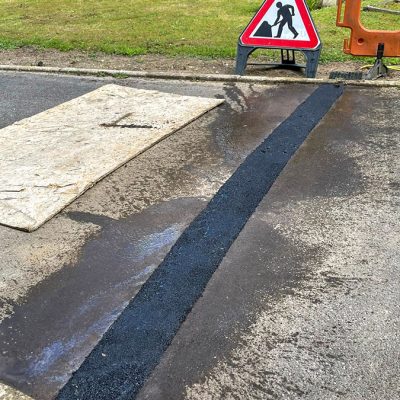 tarmac road repair at Bordon Military Cemetery